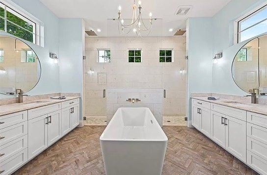 Master bath double vanity freestanding tub chandelier Holiday FL