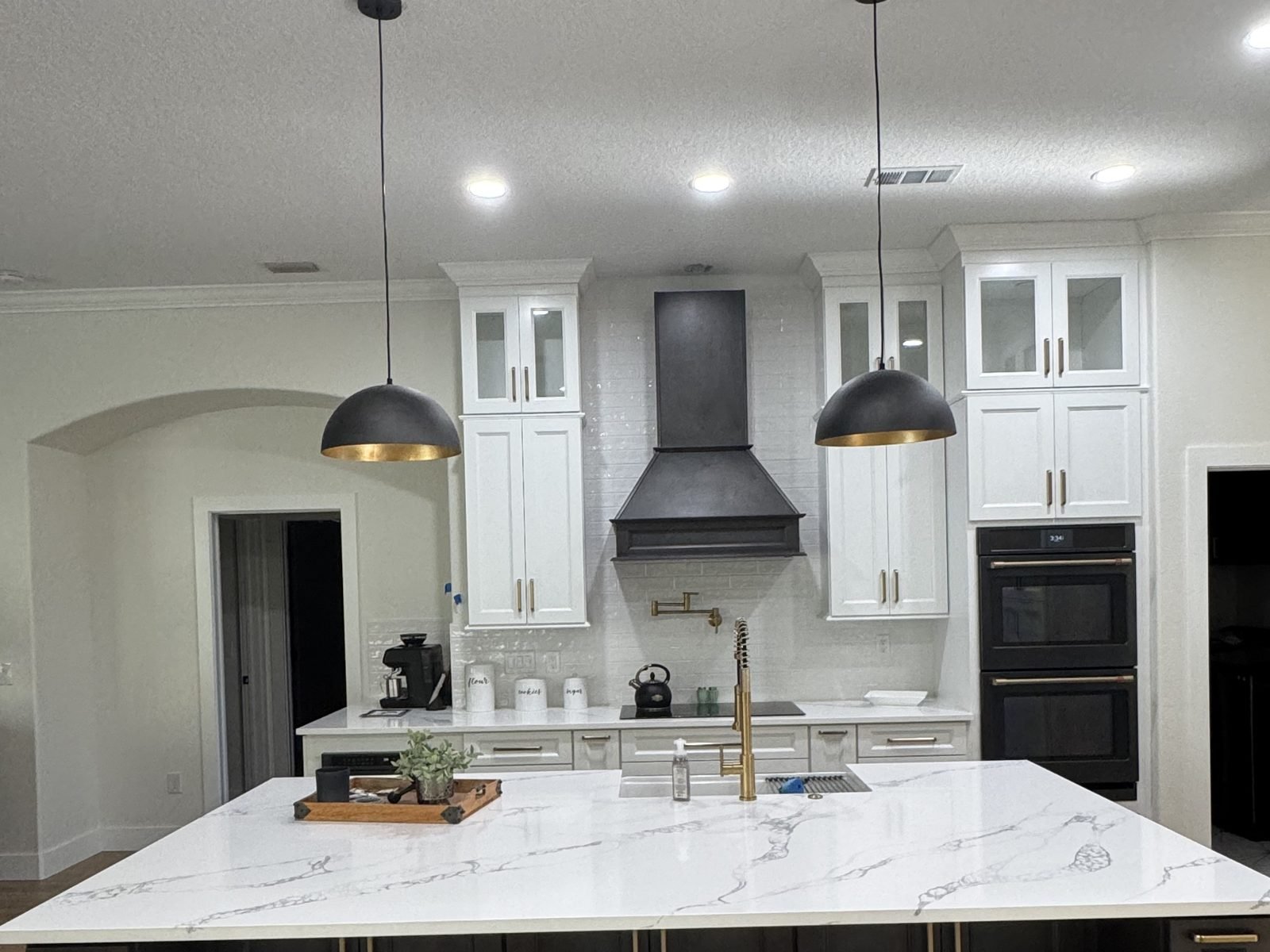 Black waterfall island chandelier kitchen Holiday FL
