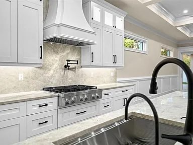 Kitchen coffered ceiling marble island Holiday FL