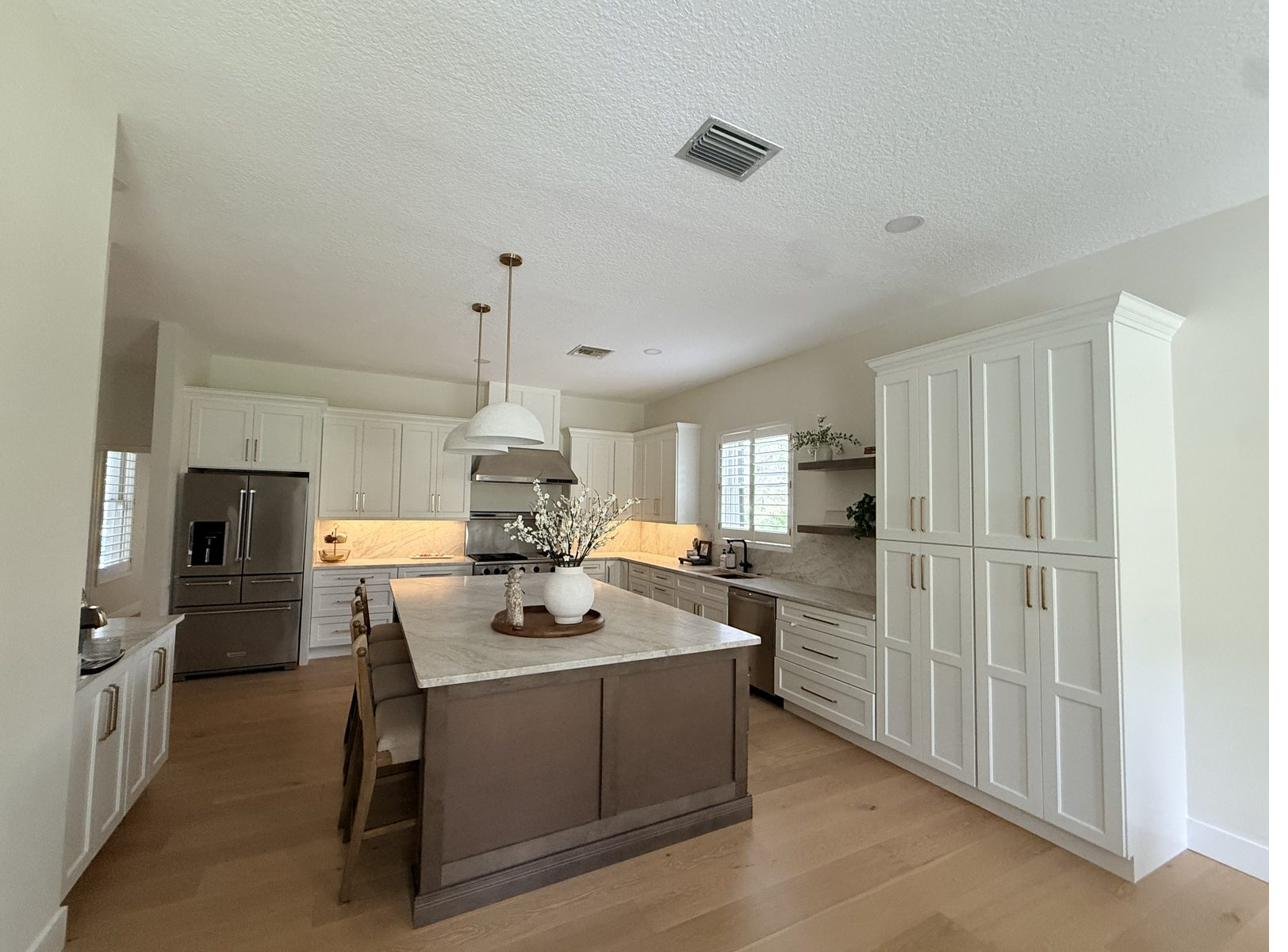 Navy blue island white cabinets Holiday FL