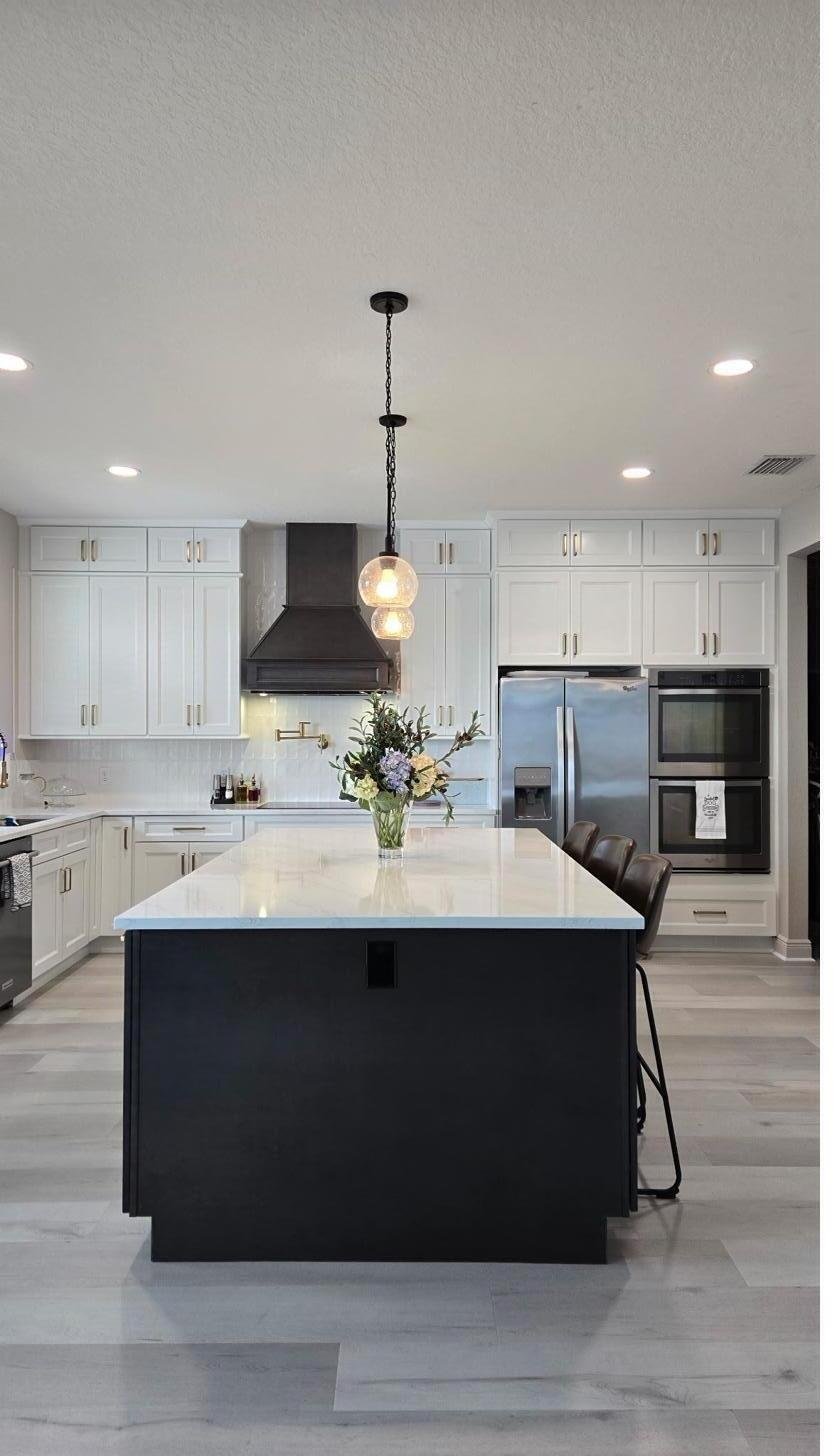 White kitchen cabinets open shelves quartz island Holiday FL