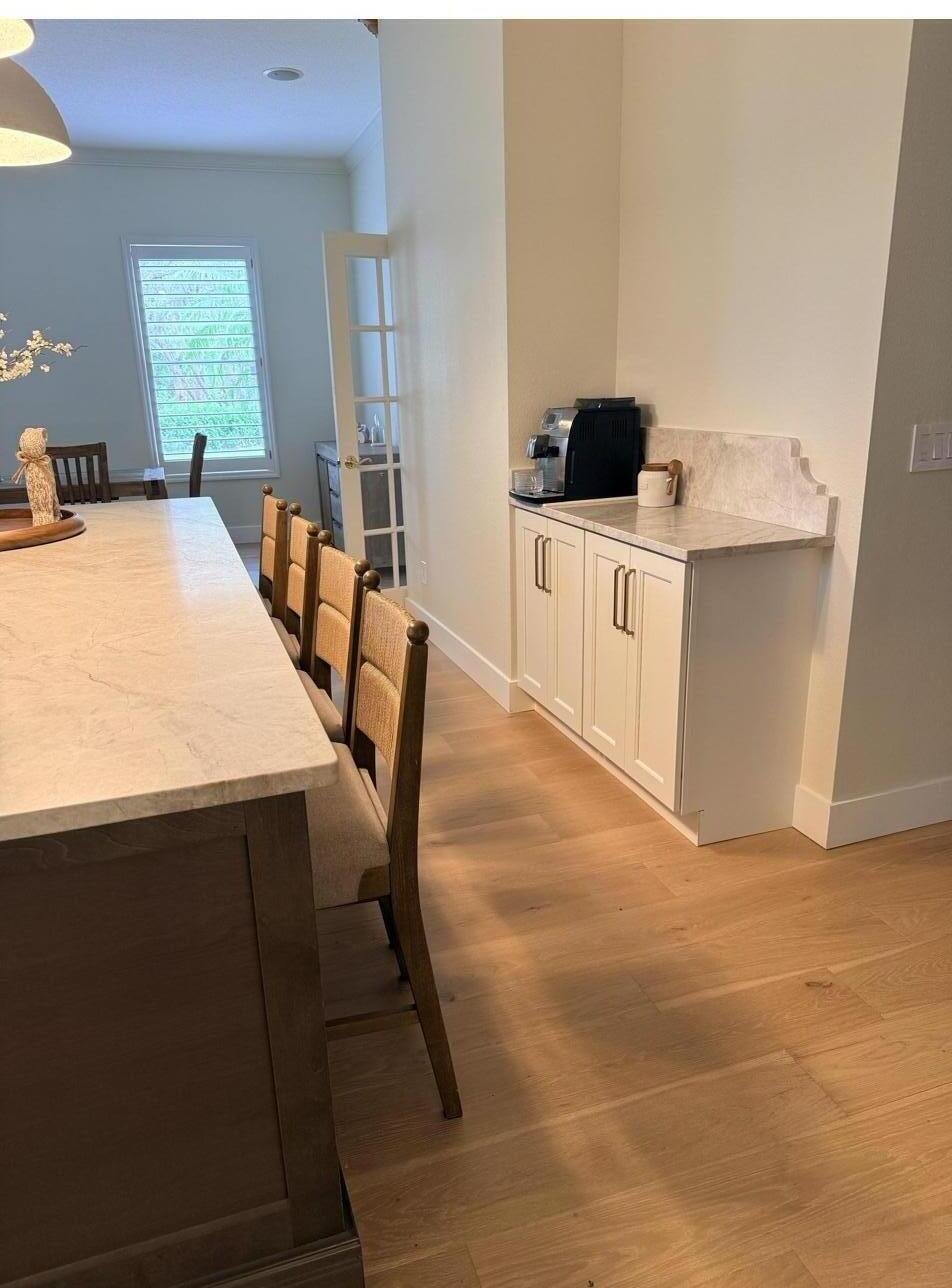 White kitchen subway tile gold pendants Holiday FL