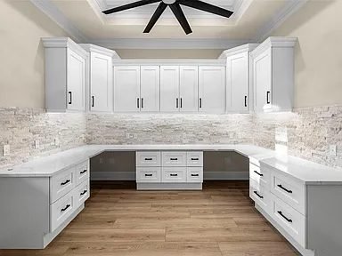 White U-shape kitchen stone backsplash Holiday FL