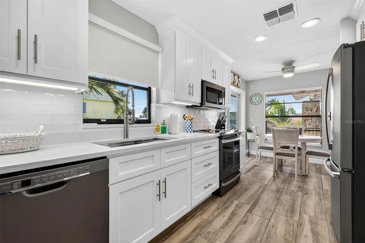 Kitchen remodel white cabinets tile Holiday FL
