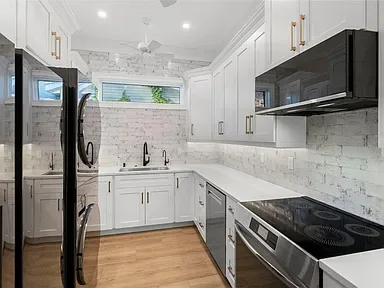 Custom white kitchen cabinets installed near New Port Richey FL by Carpet Corner Kitchen and Bath