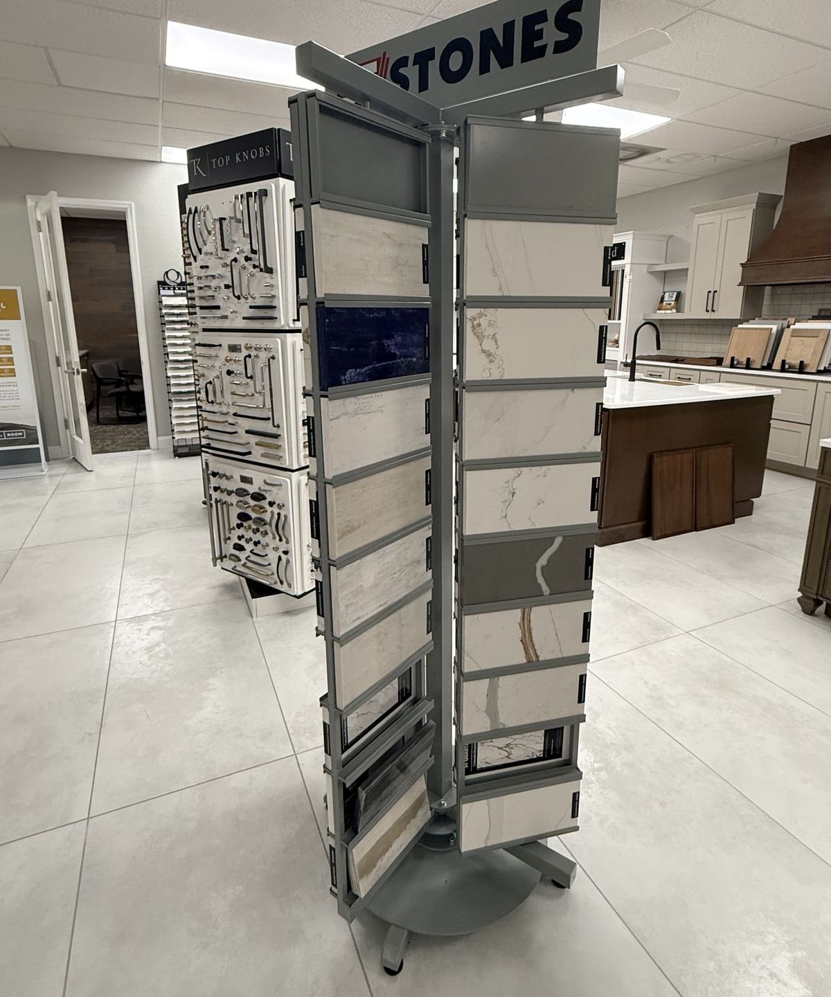 ST Stones countertop and tile sample display in Carpet Corner Kitchen and Bath showroom, Holiday FL